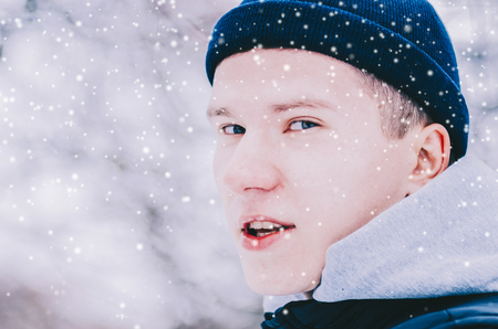Portarit of the young man in winter parkの写真素材