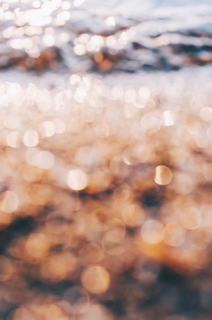 Close-up macro view on the water on sea beachの写真素材