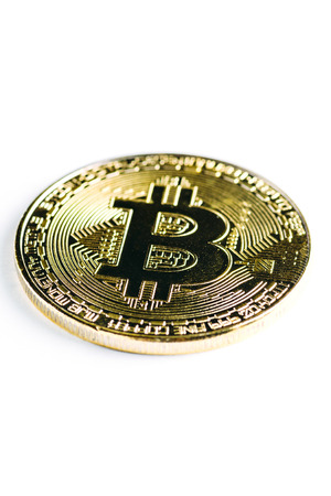 Bitcoin gold coin on white isolated backgroundの写真素材