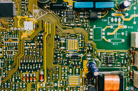 Detail of an electronic printed circuit board with many electrical components
