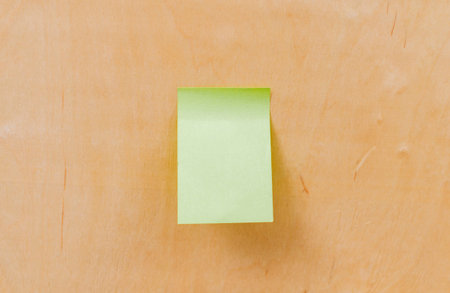 Paper note on wood texture background