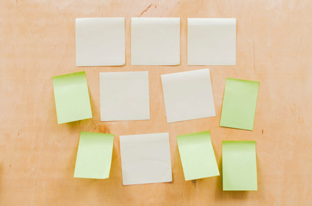 Paper note on wood texture background