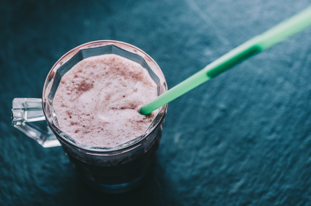 Milk fruit summer cocktail on tableの写真素材