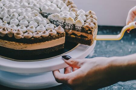 Homemade caramel cake by woman, food photoの写真素材