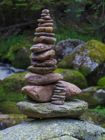 Pebbles, stacked stones as a stone statue, short depth of fieldの写真素材
