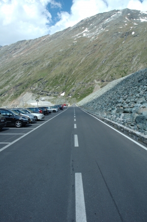 Road by mattmark dam in Alps in Switzerlandのeditorial素材