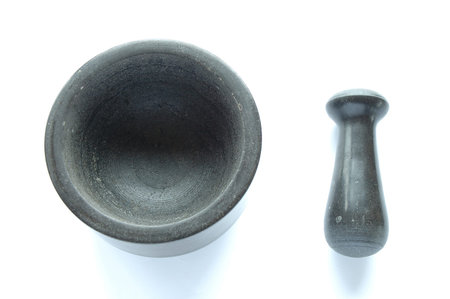 Mortar and pestle on white background