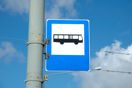 bus stop sign fixed to the postの写真素材