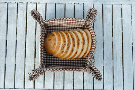 Slices of bread inside bread bin