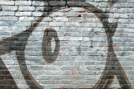 Poznan, Poland - July 13, 2014: Part of graffiti painting on old brick wall in Poznan, Polandのeditorial素材