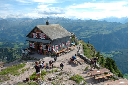 Schwyz, Switzerland - August 10, 2014: Mountain hostel, restaurant and unidentified people on Grosser Mythen peak nearby Schwyz in Switzerland.のeditorial素材