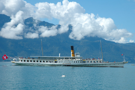 Vevey, Switzerland - August 16, 2014: Old Passenger ferry on Geneve lake in Switzerland. Unidentified people visible.のeditorial素材