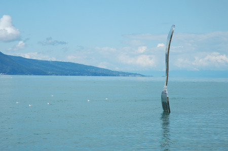 Vevey, Switzerland - August 16, 2014: Big fork in water in Vevey at Geneve lake in Switzerlandのeditorial素材