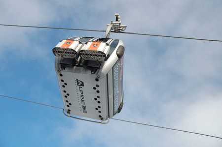Janske Lazne, Czech Republic - February 17, 2015: Cable car on gondola lift on Cerna Hora mountain...