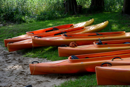 Several kayaks on lake shore.の写真素材
