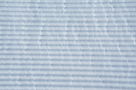 Snowcat trace on snow backgroundの写真素材