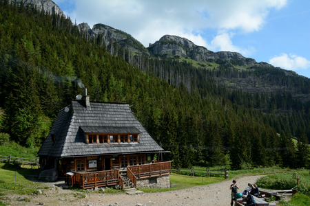 Kuznice, Poland - June 13, 2016: Mountain hostel in Kondratowa valley in Tatra mountains in Poland. Unidentified people visible.のeditorial素材