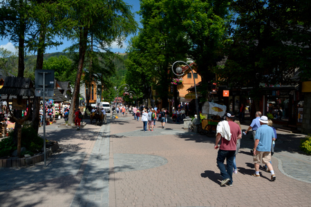 Zakopane, Poland - June 15, 2016: Krupowki street in Zakopane in Poland. Unidentified people visible.のeditorial素材