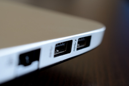 Two USB laptop slots closeup. Shallow depth of field.の写真素材