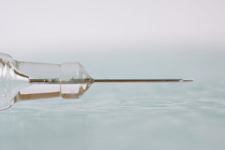 Hypodermic needle of glass syringe closeupの写真素材