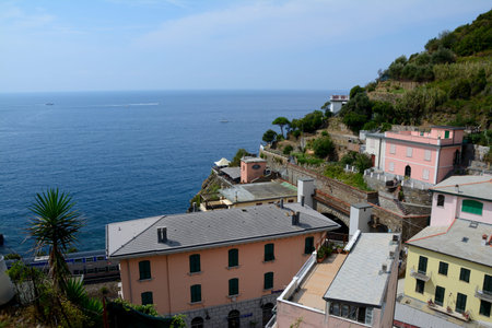 Riomaggiore, Italy - September 4, 2016: Buildings in Riomaggiore city in Liguria, Italy.  One of...
