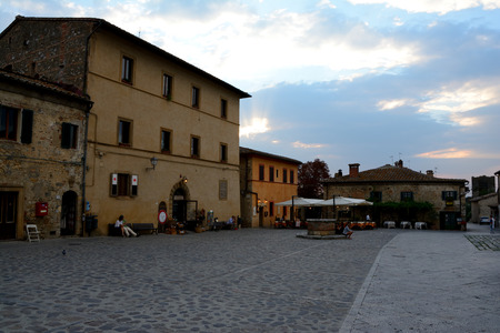 Monteriggioni, Italy - September 7, 2016: Buildings in Monteriggioni city in Tuscany, Italy. Unidentified people visible.のeditorial素材