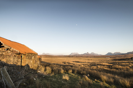 Bothy & Mountains at Achnahaird in the Coigach, Scotland.の写真素材