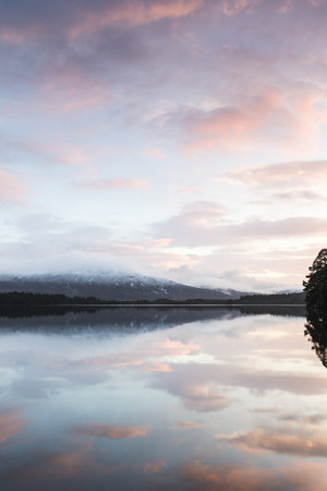 Loch Garten and evening cloud in the Cairngorms National Park of Scotland.の写真素材