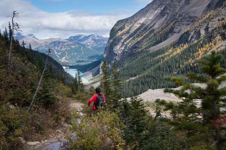 Hiking at Plain of Six Glaciers track towards Lake Louise, Banff National Park, Canadian Rockiesの写真素材