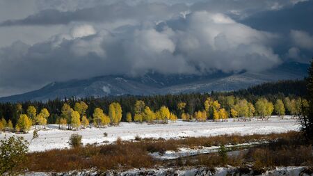 Stormy clouds over the Grand Teton National Park in autumn,の写真素材