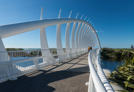 People walking on Te Rewa Rewa bridge. New Plymouthの写真素材
