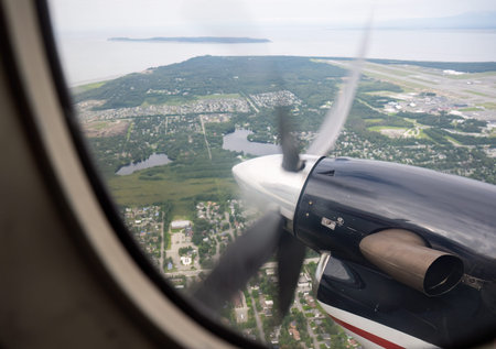 Aerial view of Anchorage from a small airplane with a running propeller. Alaska.