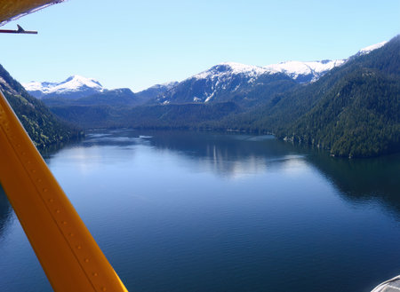 A floatplane landing on the lake of Misty Fjords National Monument. Alaska. USA.