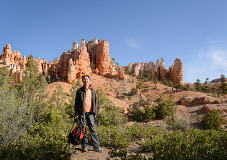 Tourist posing for photos at Bryce Canyon National park. Utah. USA.の写真素材