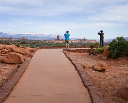 Tourists taking photos using smartphones at Arches National Park. Utah. USA.の写真素材