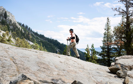 Man hiking Eagle Lake trail. South Lake Tahoe. California.の写真素材