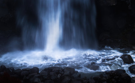 Taranaki Falls fanning out at its base in circular ripples. Tongariro National Park. New Zealand.の写真素材