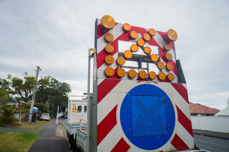 Work truck with cross warning sign. Roadworks in Auckland.の写真素材