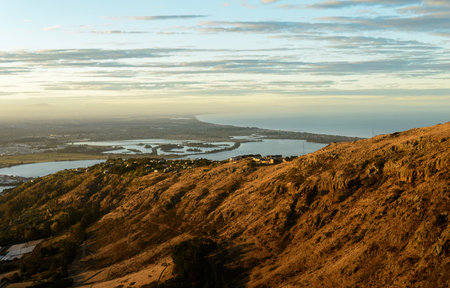 View of Port Hills at sunset. Canterbury. South Island of New Zealand.の写真素材
