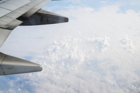 Aerial view of clouds from an airplane flying towards Anchorage. Alaska. USA.