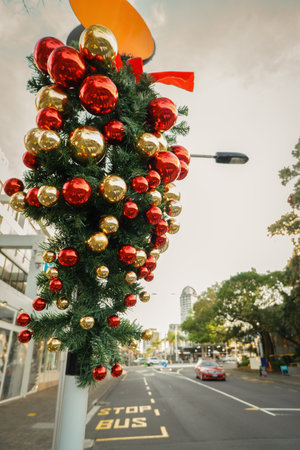 Christmas decorations on pedestrian crossing traffic post. Takapuna. Auckland.の写真素材