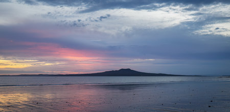 Rangitoto Island at dawn. Milford Beach. Auckland.の写真素材