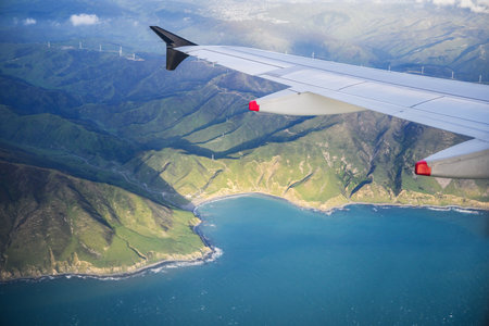 Aerial view of mountains and bays from an airplane flying towards Wellington Airport. New Zealand.の写真素材