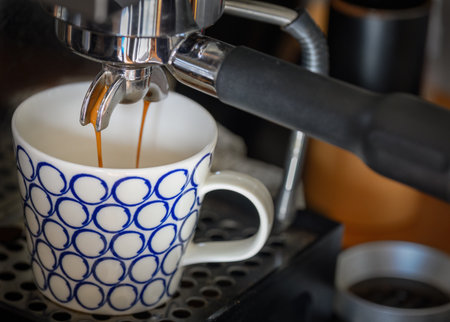 Making coffee using Espresso Machine at home.の写真素材