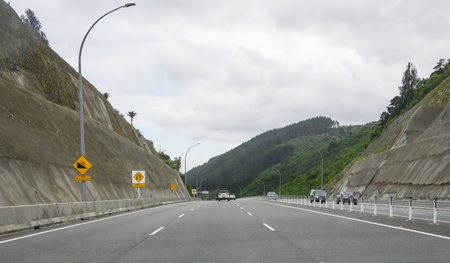 Transmission Gully Motorway. 8% Slope Road sign by the motorway. Wellington Northern Corridor.の写真素材
