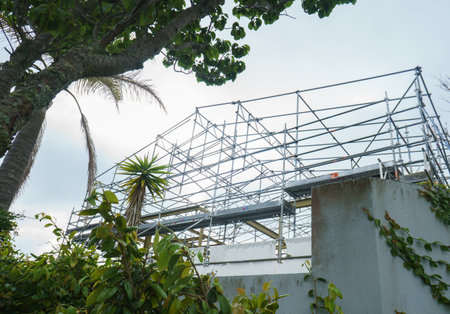 Residential house under construction with scaffolding around it. Auckland.の写真素材