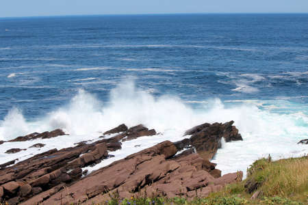 Rugged landscape and the Atlantic ocean on a sunny day in July の写真素材