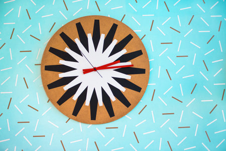 funny clock on the blue wall