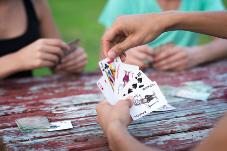Group of people playing cardsのeditorial素材