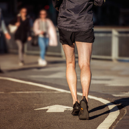 Man running on asphalt runners road in the New York Cityの写真素材